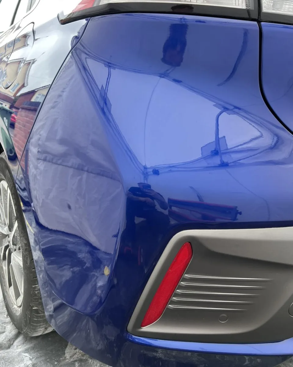 Blue Hyundai rear bumper after cosmetic repair